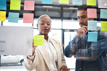 Image showing Creative people, team and thinking in planning for schedule brainstorming or meeting at office. Man and woman in teamwork decision for project plan, tasks or sticky note ideas in startup at workplace