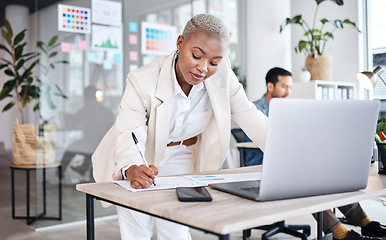 Image showing Business woman, writing and graphic designer with notes and information for project. Company, African female person and design strategy in a office with pen and document for website work at agency