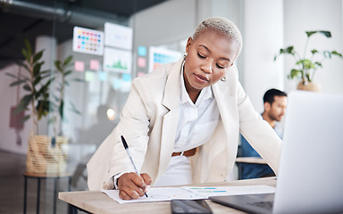 Image showing Business woman, writing focus and graphic designer with notes and information for project. Company, African female person and design in office with pen and document for website work at agency