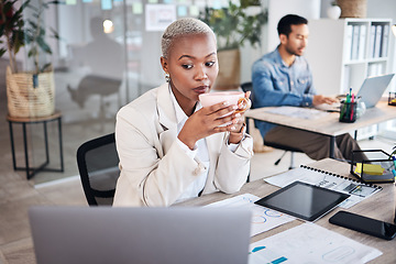 Image showing Thinking, coffee and business black woman on laptop working on online proposal, strategy and planning. Corporate, ideas and female person in workplace with beverage, caffeine and tea on computer