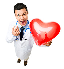 Image showing Angry, syringe and portrait of doctor with heart on isolated, PNG and transparent background. Healthcare, medical and crazy man health worker with balloon for cardiology service, exam and injection