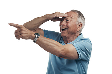 Image showing Surprise elderly man, looking far and pointing after discover with smile or attention on isolated transparent png background. Senior person, happy and hand with wow, search and show logo for promo