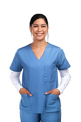 Image showing Medical, professional and portrait of a happy female doctor, nurse or surgeon in scrubs. Confidence, smile and face of a young Mexican woman healthcare worker isolated by transparent png background