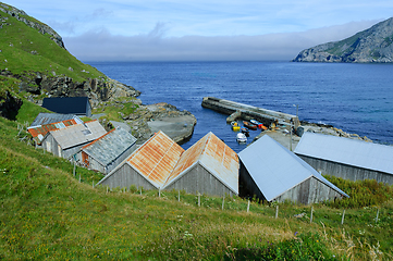 Image showing Boathouse and harbor by the coast