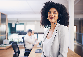 Image showing Portrait, call center and customer service with a black woman consultant working in her telesales office. Contact us, support and telemarketing with a female employee consulting using a headset