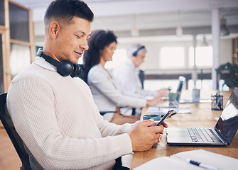 Image showing Phone, typing and man in startup with business networking, planning online or communication. Professional worker in coworking office space on smartphone, cellphone or multimedia for productivity