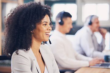 Image showing Happy, service and black woman in a call center for consulting, help and communication. Contact, talking and African customer support employee smiling for sales, advice and speaking for telemarketing