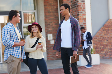 Image showing Catching up before class. Cropped shot of a group of university students hanging out between class.