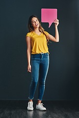 Image showing Shes quite the bubbly type. Studio shot of a beautiful young woman holding a speech bubble.