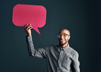 Image showing Speak your mind. Studio shot of a handsome young man holding a speech bubble.