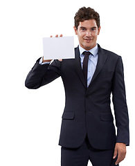 Image showing Something youll want to see...A young businessman holding a blank placard.