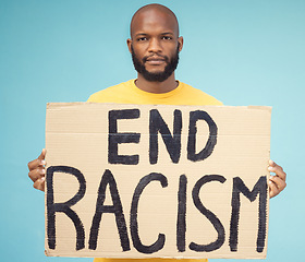 Image showing End racism poster, black man and protest isolated on blue background for social justice, change and equality problem. Youth, fight and cardboard sign for human rights, politics and person portrait