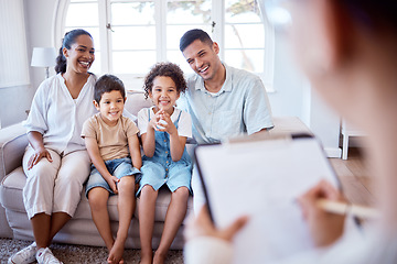 Image showing Parents, children and psychology with family therapy, smile and together on sofa, support and discussion. Young kids, mom and dad on couch with psychologist, listening and talking for mental health