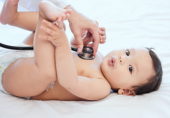 Image showing Stethoscope, health and baby in a clinic, checkup and wellness with heartbeat, growth and cardiology. Closeup, young person and infant with medical issue, appointment and doctor with a child and care