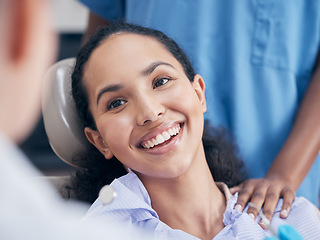 Image showing Dentist, healthcare and woman with a smile, checkup and teeth with oral hygiene, treatment and cleaning gum bacteria. Female person, patient and lady with dental care, prevent tooth decay and disease