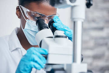 Image showing Science, woman scientist using a microscope and in a lab for health analytics. Chemistry specialist or medical, biotechnology and female doctor or surgeon for biology research in a laboratory.