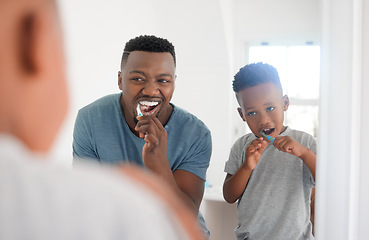 Image showing Black man brushing his teeth with his kid for dental hygiene, health and wellness in the bathroom. Oral care, teaching and young African father doing morning mouth routine with his boy child at home.