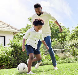 Image showing Soccer game, dad and happy kid on a garden with exercise, sport learning and goal kick together. Lawn, fun father and black family with football on grass with youth, sports development and bonding