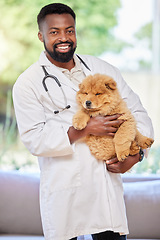 Image showing Black man, vet and portrait with puppy for clinic, medical and animal support with a smile. Happy, African male person and veterinarian employee with a cute dog and professional with care at job