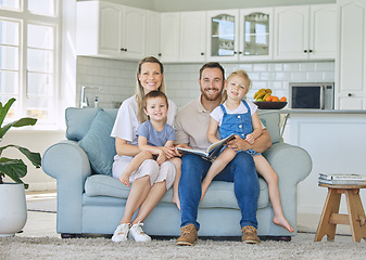 Image showing Happy, love and family portrait on a sofa with book for learning, reading and bonding in their home. Face, smile and storytelling by parents and children in living room for child development indoors