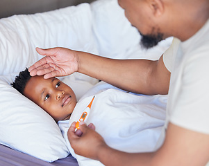 Image showing Father, thermometer and sick child in bed with a fever and hand of dad on head to check temperature. Black boy kid and a man together in a bedroom for medical risk, health test and virus problem