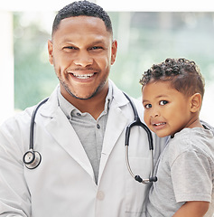 Image showing Doctor, child and happy portrait for health care in hospital with a smile at a consultation. Face of black man or pediatrician and kid patient for medical help, family insurance or development check
