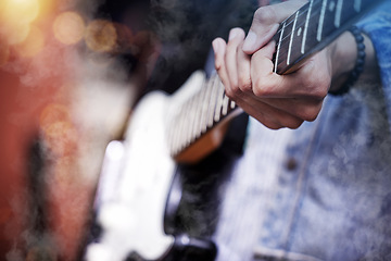 Image showing Guitar, rock and man hands at music festival show playing band with electric instrument with lights. Sound, musician and party with live talent and audio for punk event with people at a concert