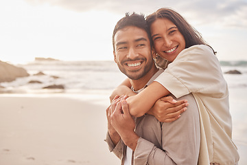 Image showing Love, portrait of couple and on the beach happy together with a lens flare. Care or support, summer vacation or holiday break and smile with young people at the sea for a romantic date outdoors