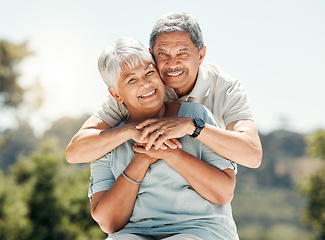 Image showing Senior couple, portrait and hug in nature on vacation, holiday or summer bonding. Face, hugging and retirement of man and woman with a smile, love and enjoying romantic time together on mockup space.