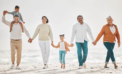 Image showing Happy family, fun portrait and beach with grandparents, parent love and kids together by sea. Outdoor, vacation and children with grandmother and father by the ocean on holiday in group with a smile