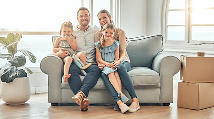 Image showing New home, sofa and portrait of parents and children in living room for bonding, quality time and relax together. Happy family, support and mom and dad with girls for care, love and smile in house