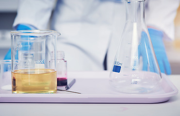 Image showing I have all I need for the experiment. Closeup of an unrecognizable scientist standing next to a tray of test tubes with chemicals in them ready to be used for experiments.