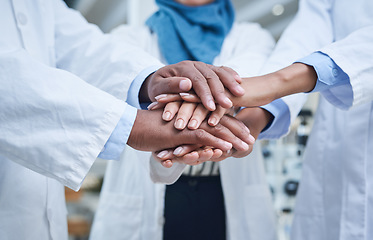 Image showing Closeup, hands and group in a hospital, healthcare or scientists with support, motivation or solidarity. Zoom, coworkers or medical professional with teamwork, collaboration or team building in a lab