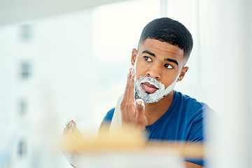 Image showing Morning, mirror and shaving with man in bathroom for grooming, hair removal and cleaning. Skincare, razor and self care with face of male person and foam at home for facial, beard and hygiene