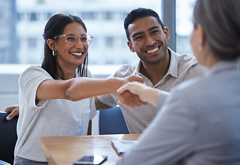 Image showing Couple, happy and handshake with financial consultant for deal, agreement or contract. Smile, man and woman shaking hands of broker for finance, loan or mortgage, welcome and thank you for investment