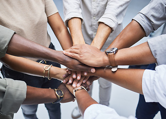 Image showing Hands, support and people together for teamwork, solidarity or group collaboration from above. Workforce, diversity and networking in community, business or company staff huddle for team building