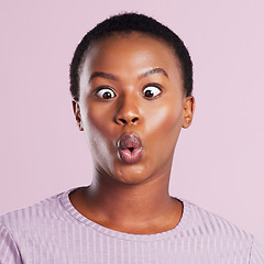 Image showing Female person, funny and squinting eye with pink studio background in closeup in africa with emoji and closeup. Woman, eyes and silly faces and mouth with meme and weird expression for comedy.