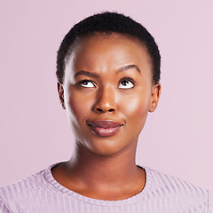 Image showing Woman, annoyed and face in pink studio background with skin in africa for emoji. Female person, silly and faces with eye roll with thinking expression for beauty and skincare with smile for youth.