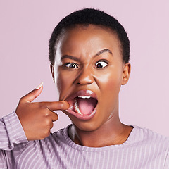 Image showing Woman, squint and face in pink studio background with closeup in africa with meme. Female person, portrait and squinting eyes for comedy expression with joy and goofy girl with weird or crazy look.