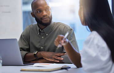 Image showing Business man, meeting and listening to discussion in office for collaboration, team and planning ideas together. Black male, employees and conversation of project, work and hearing feedback in agency