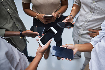 Image showing Group, blank phone screen and people with mockup on mobile, social network app and website from above. Closeup, hands and smartphone technology for digital download, sharing data or cellphone contact