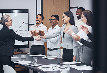 Image showing Business people, handshake and applause in meeting for hiring, teamwork or partnership agreement at office. Group shaking hands or clapping in team recruiting success or corporate growth at workplace