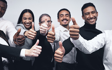 Image showing Happy, business people and thumbs up for winning, success or team approval together at office. Group of employee workers with smile showing thumb emoji, yes sign or like for teamwork, win or goals