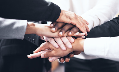 Image showing Business people, meeting and hands together for teamwork, unity or collaboration at the office. Hand of group touching for team agreement, motivation or support in trust, solidarity or integration