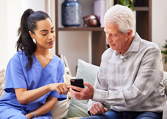 Image showing Nurse, woman and elderly patient with a smartphone, couch or connection with telehealth, website information pr schedule. Female employee, old man or caregiver with a cellphone, results or mobile app