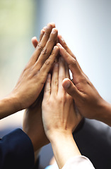 Image showing High five, success and hands of employees for team building, meeting or collaboration. Unity, diversity and closeup of group of business people in celebration of goals, achievement or teamwork.