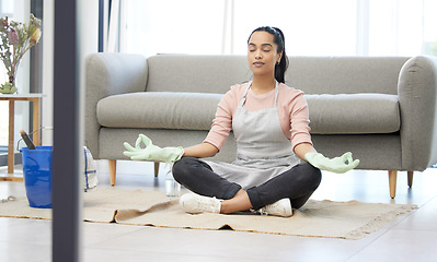 Image showing Living room, clean and woman with yoga, lotus and breathing exercise on a floor during housework at home. Cleaning, break and woman in meditation in lounge for balance, zen and mental health wellness