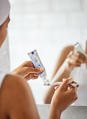 Image showing Bathroom, toothpaste and woman brushing teeth, morning and routine for dental hygiene, wellness and mirror. Female person, closeup or girl with oral health, clean mouth or fresh breath with self care