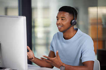 Image showing Call center, man talking and computer for customer service, crm and support or advice. Happy black male person, consultant or agent with a headset for help desk, sales and telemarketing with internet