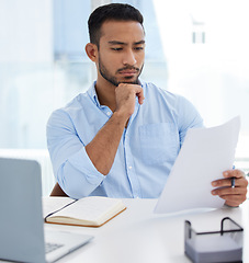 Image showing Reading, documents and business man thinking, problem solving or looking for solution in office workplace. Computer, paperwork and serious male professional read report, planning or focus on contract